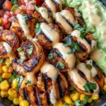 Grilled Shrimp Bowl with Avocado, Corn Salsa & Creamy Sauce Awaits You!