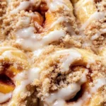Peach Cobbler Cinnamon Rolls with Crumb Topping